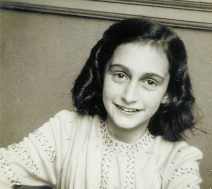 Anne Frank smiling for her school photograph, December 1941
