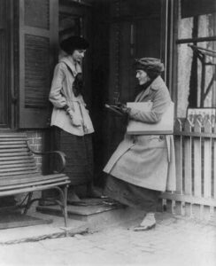 Woman taking the U.S. census, circa 1909-1932